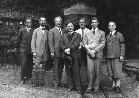 Walter Munk (second from right), his stepfather Rudolf Engelsberg (hat in hand, director of the mine), and others at the W...