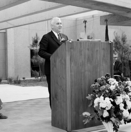 Chancellor William J. McGill at podium during dedication of the Basic Science Building, UC San Diego