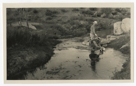 Men by river, Baja California