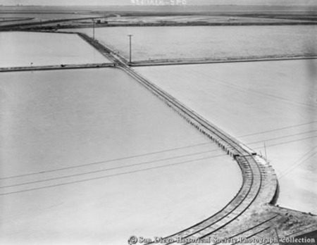 Railroad tracks cutting across sea water reservoirs, Western Salt Company, Chula Vista