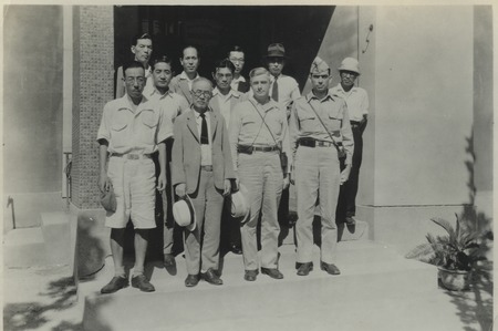 Claude M. Adams (front, second from right) visit to shipbuilding company of the Nisshin Maru whaling ship. Japan, c1947