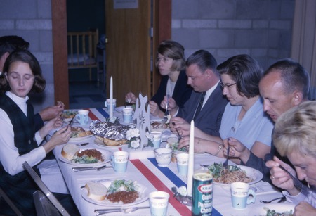 Graduate students and spouses from Germany, Sweden, Chile and Norway dining at University Lutheran Church across the stree...