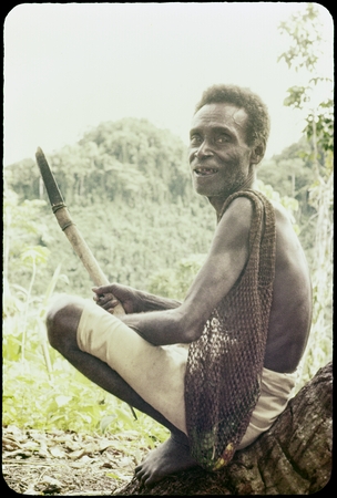 Man with a knife and stringbag