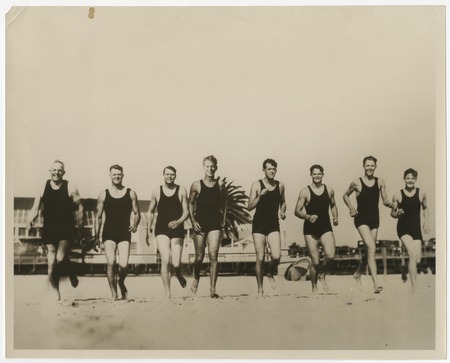 Fletcher family swim team running on the beach (edited version)
