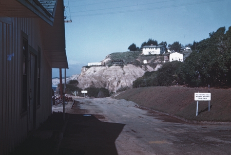 Service road on the Scripps Institution of Oceanography campus, with the &quot;T&quot; cottages in the background on the hills, wher...
