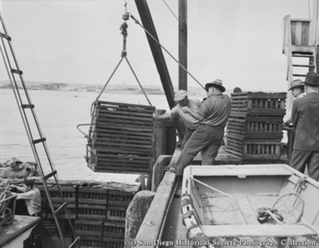 Men unloading crates of lobsters, Chesapeake Fish Company