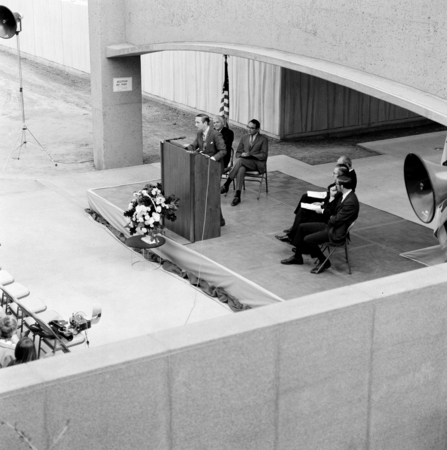 Speaker at podium during dedication of the Basic Science Building, UC San Diego