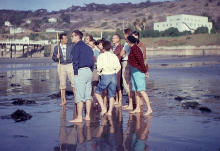 Geology class (Ocean 111) on the beach near the campus of Scripps Institution of Oceanography measuring wave heights. Doug...