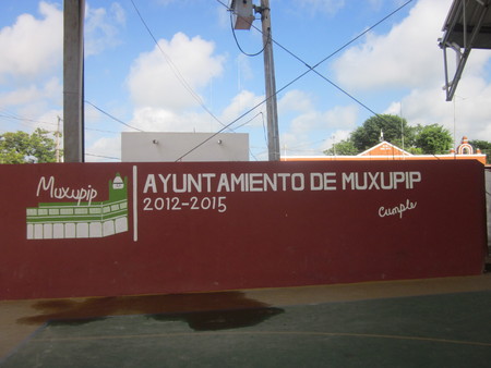 Wall with text &quot;Ayuntamiento (Town Council) de Muxupip 2012 to 2015&quot;