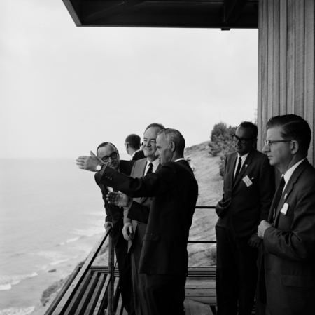 Vice President Hubert Horatio Humphrey visits the Scripps Institution of Oceanography campus, looking up the coastline fro...