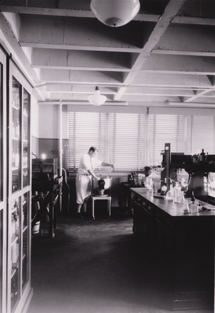 Scripps Institution of Oceanography biochemistry Laboratory, Ritter Hall. Denis Llewellyn Fox at work. October 1933