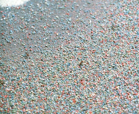 America: detail of colored sand