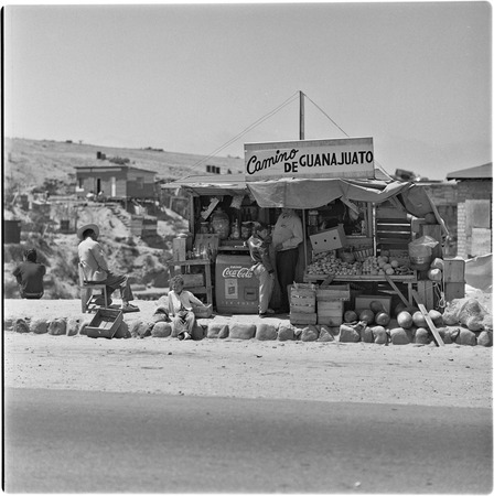 Fruit and soft drink vendors in one of the irregular settlements