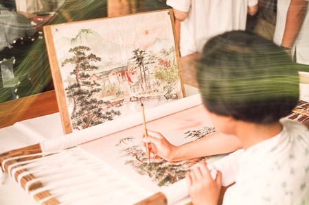 Artist Making Embroidery