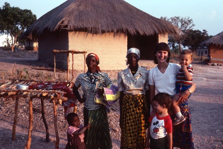 Portrait at Nsama village of Mrs. Faustina Mwenya (left) and Mrs. Duly and Donna, Michael and Daniel Cancel