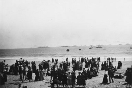 People on Coronado beach watching Great White Fleet heading toward San Diego Bay
