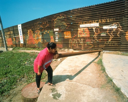 International Waters: pipe from Mexican side of the border fence