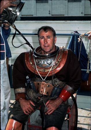 James Ronald Stewart in an atmospheric pressure diving suit, on assignment for the Commercial Diving Center, Wilmington, CA