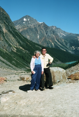 Carl L. Hubbs and Laura C. Hubbs looking northwest from moraine of Mt. Edith Savell Glacier, Lake Cavelle in distance, Alb...