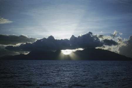 View of Moorea Islandat at sunset in French Polynesia in the South Pacific as seen from sea from one of the research ships...