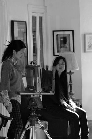 Chinese photographer with Xiaojian in Brooklyn house