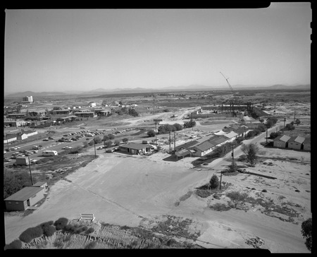 View of Veteran&#39;s Administration Hospital construction; Matthews Apartments; various Camp Matthews buildings looking east