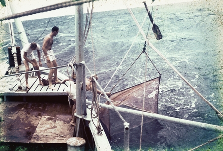 Lowering the trawling net from R/V HORIZON