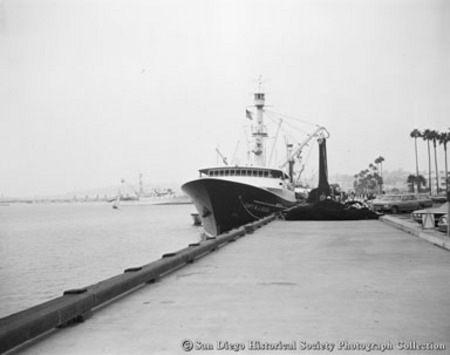 Tuna boat Capt. M.J. Souza moored to dock at Harbor Drive and Ash Street