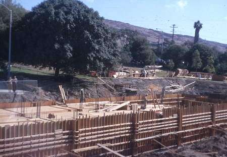 Construction workers putting in forms for the first floor during construction of a new building on the campus of Scripps I...