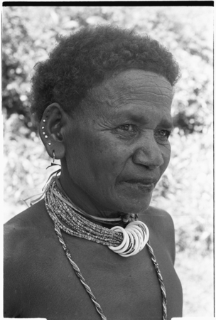Portrait of &#39;Etenga wearing tale&#39;ekobi necklace on &#39;afi&#39;afi shell beads.