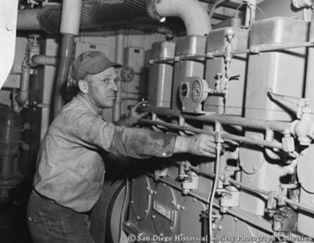 Man in engine room of tuna boat Katie Lou