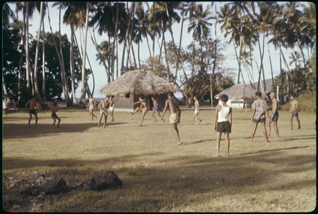 Boys playing soccer, Society Islands