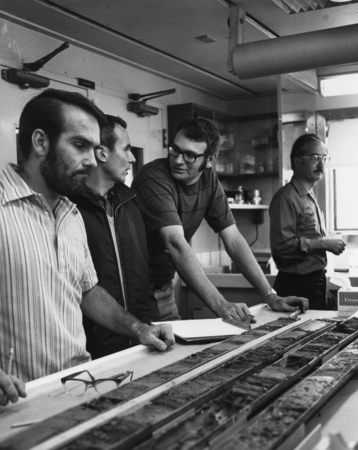 SEDIMENTARY CORE STUDY-Dr. LaVerne D. Kulm, third from left, showssome sedimentary core material taken in 10,000 feet of w...