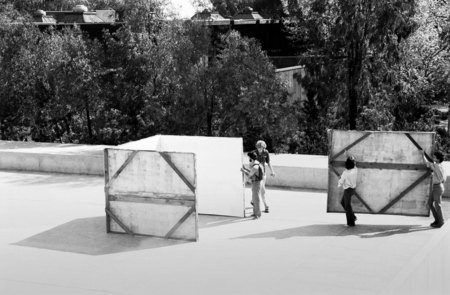 Students installing sculpture on Mandevile Center terrace