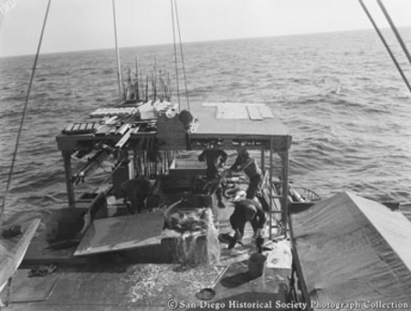 Stern canopy and fishermen on tuna boat
