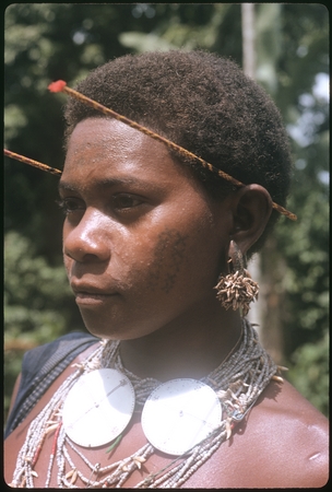 Woman wearing traditional ornaments.