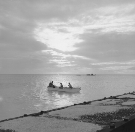 Four men on skiff, Bikini Atoll