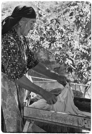 Joséfa Arce Sandoval washing clothes at Rancho San Gregorio
