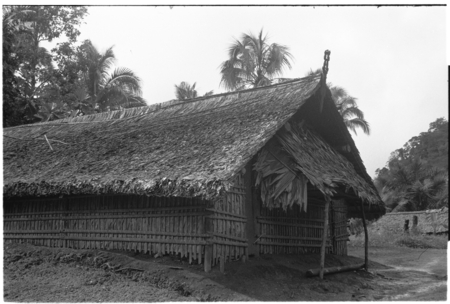 Houses in what appears to be a coastal Christian village, likely not in Kwaio.