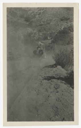 Transporting steel pipe for the San Diego flume