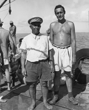 Ben Masters, chief of Palmerston Island, visits with Roger Revelle aboard R/V Spencer F. Baird