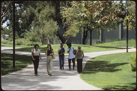 Students walking in front of Main Gymnasium