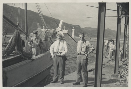 Claude M. Adams (middle) during his visit to a Japanese fishing village and fish processing plant. Japan, c1947. Adams wor...