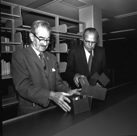 Francis Smith (left) and Melvin Voigt (right), during ceremony celebrating UC San Diego library collections