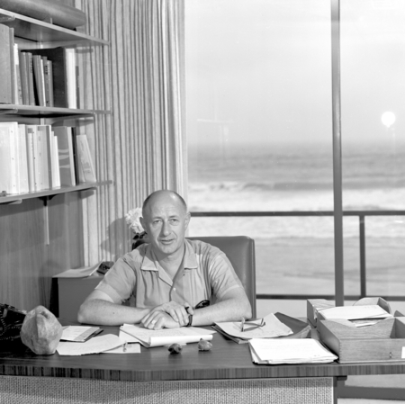 Fred Noel Spiess at desk