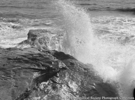 Waves crashing on to rocky coast