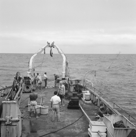 [Nova Expedition, R/V Argo, 1967] G-10. Pago Pago [Deck of R/V Argo at Sea] [Slack wire buoy launched in slide above separ...