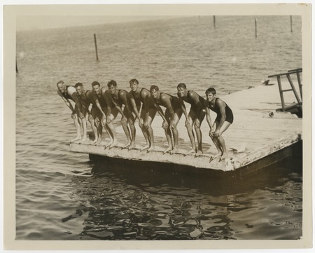 Fletcher family swim team on a dock in Coronado
