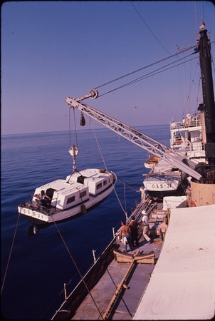 Utility boat alongside the USC&amp;GS Pioneer during the International Indian Ocean Expedition. 1964
