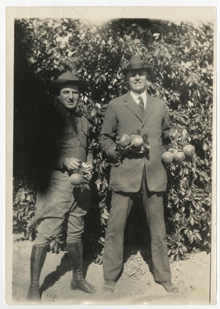 Ed Fletcher with man in a citrus grove